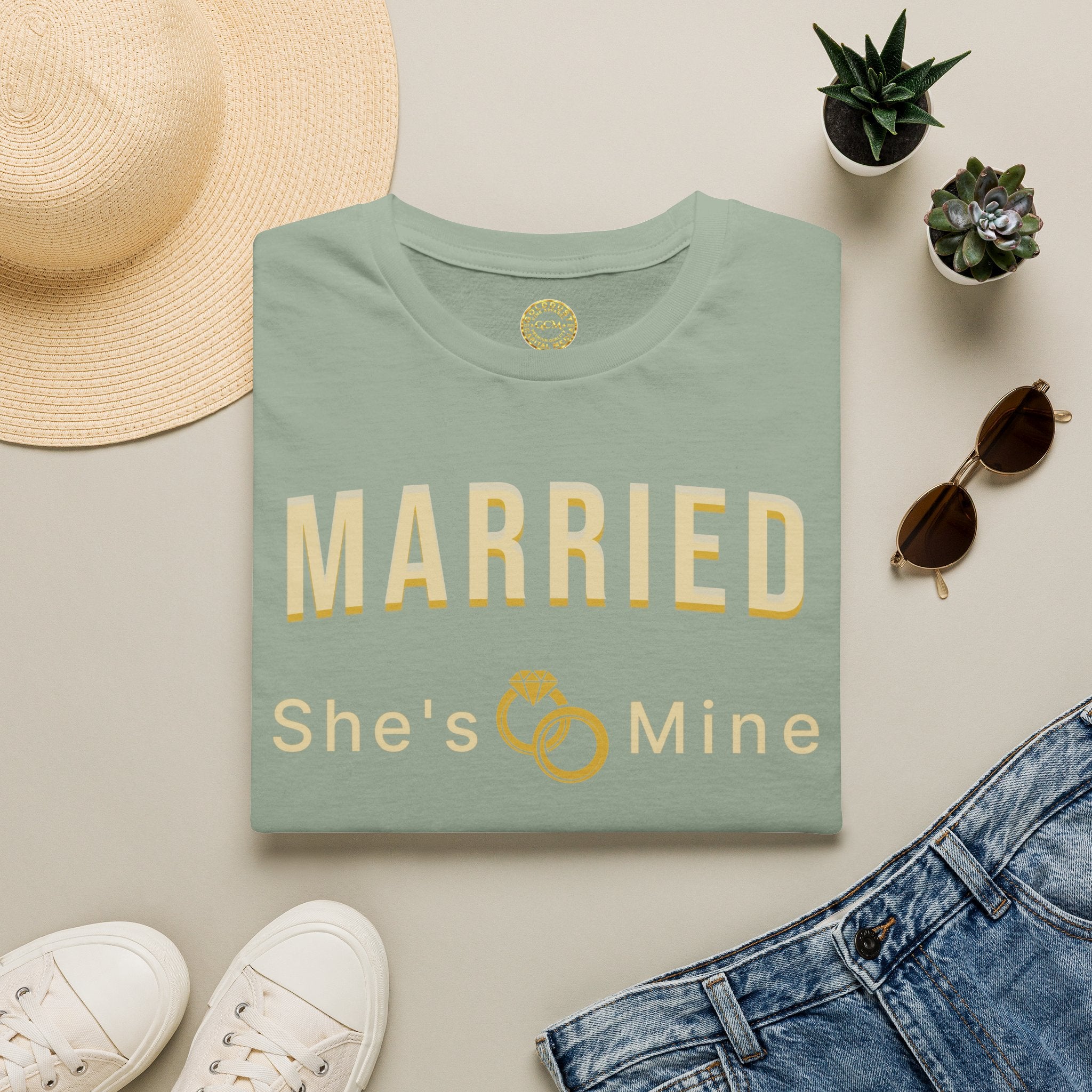 Married “She’s Mine” Tee Shirt | Elegant  print that reads “MARRIED” above a delicate rings motif and “She’s Mine | Wedding Tee
